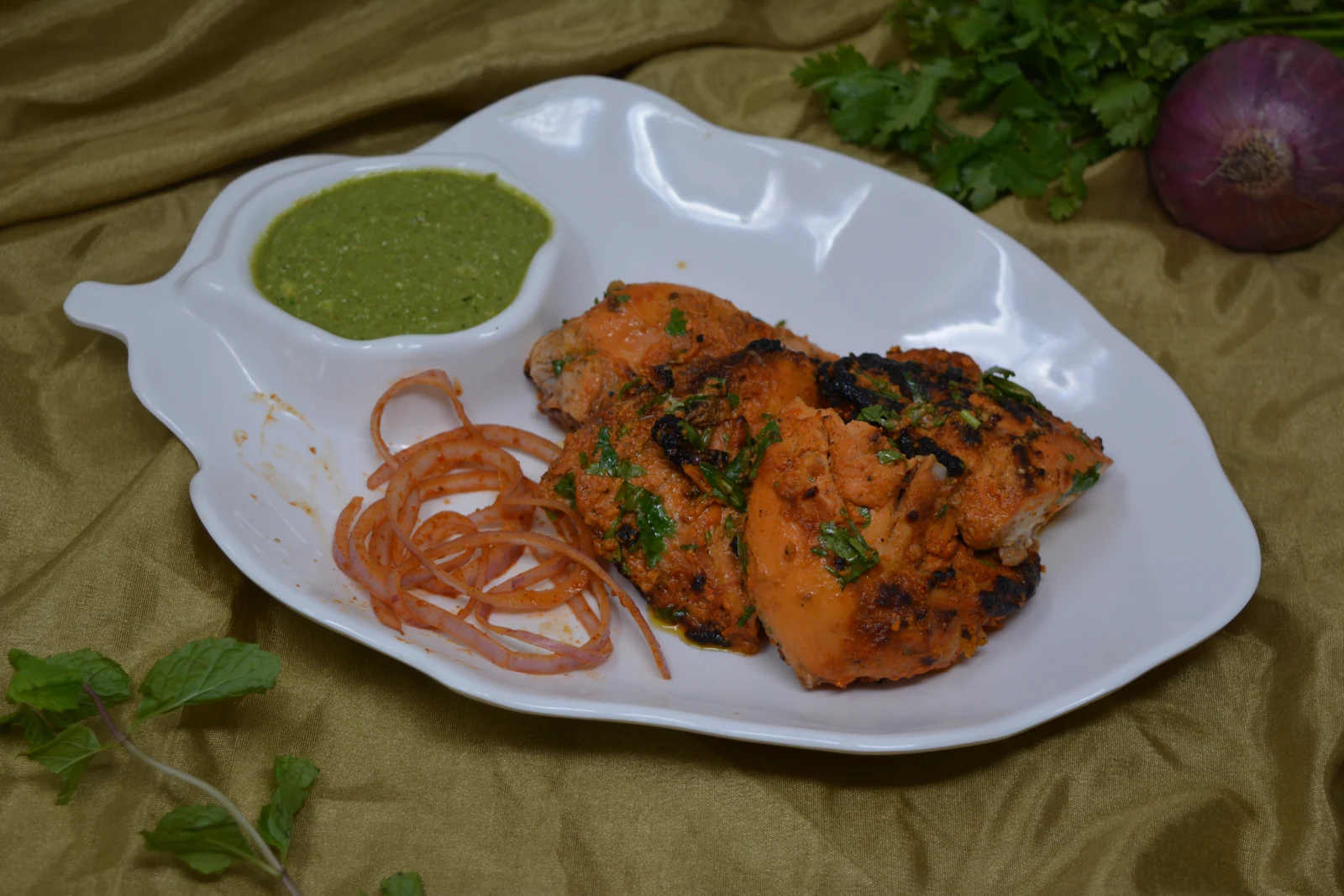 Tandoori chicken with onion and green chutney from the academy archive Tandoori chicken with onion and green chutney from the academy archive