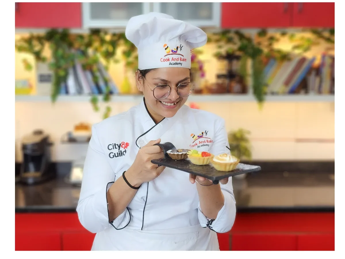 A student presenting a finished dish A student presenting a finished dish